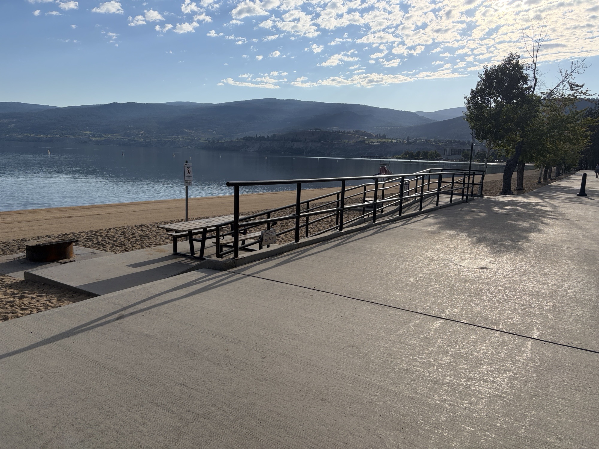 Ramp leading to picnic table and fire pit at Okanagan Lake