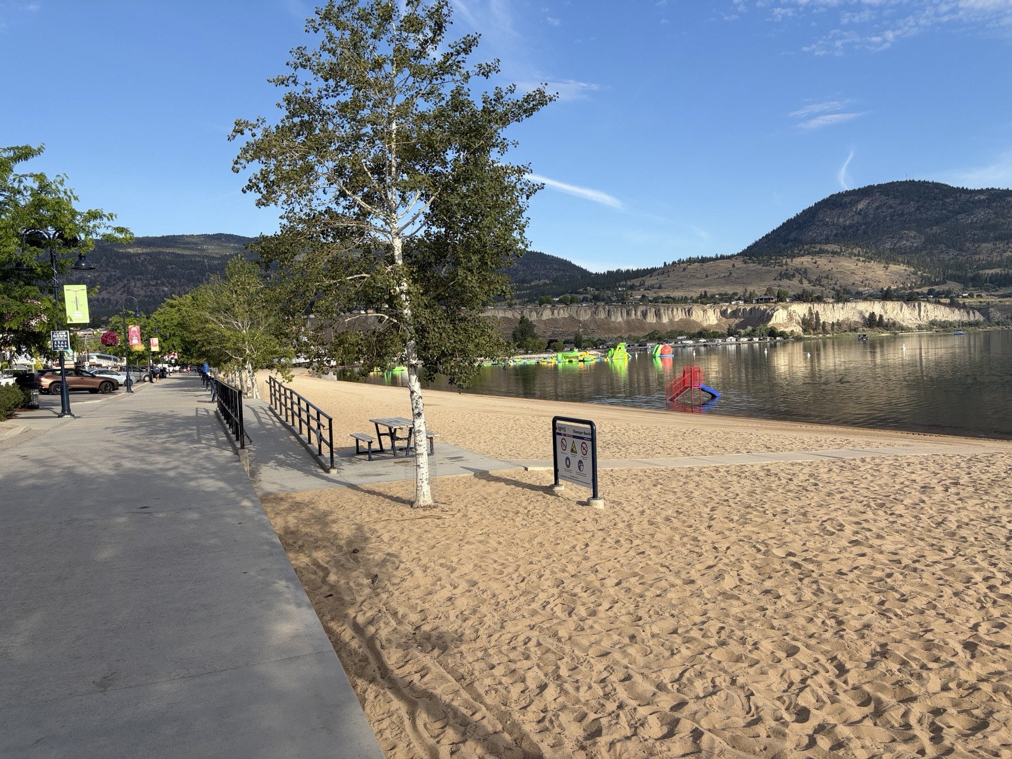 Ramp leading to accessible table and water's edge of Okanagan Lake