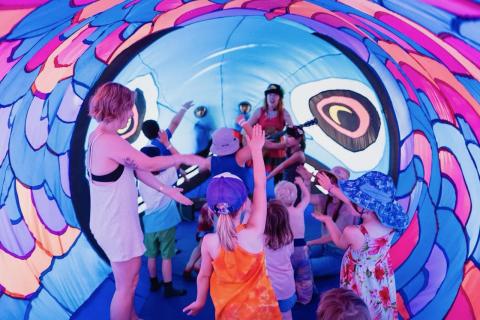 Kiki the EcoElf brings her giant inflatable salmon to the Penticton Art Gallery for songs, stories, and lively kids’ dance parties (Photo courtesy: Ignite the Arts)