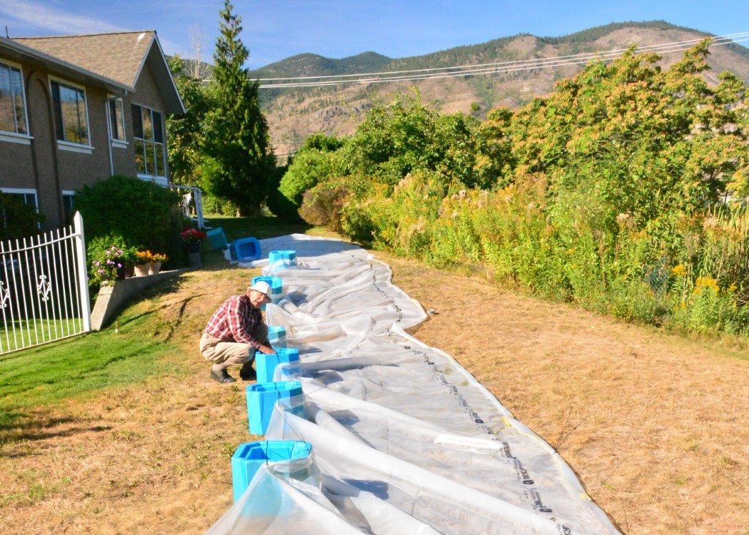 Construction and placement of a silt fence, courtesy of Friends of the Oxbows.